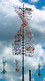 dandelion sculpture turns in the wind 